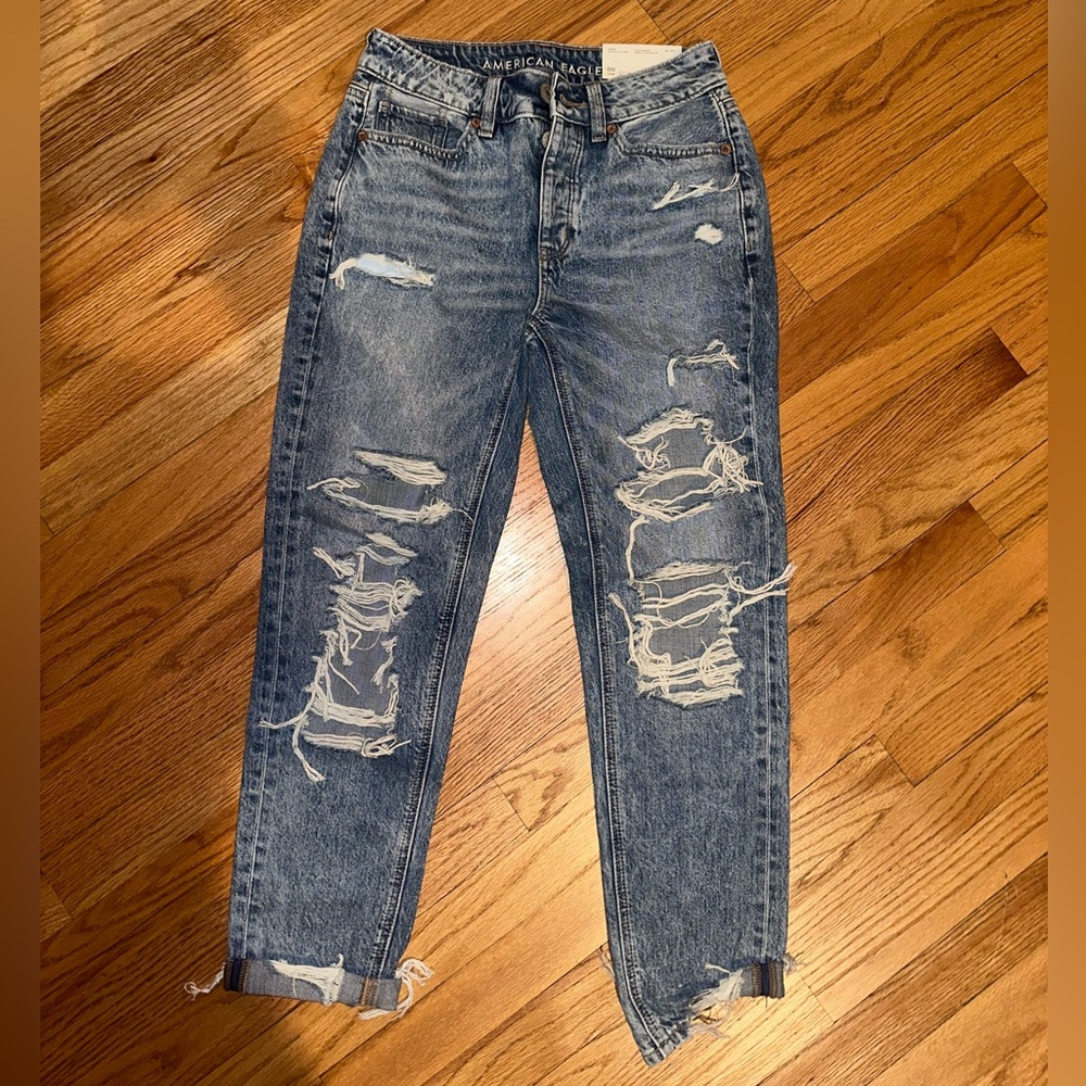 American Eagle ripped jeans. Low rise TomGirl size 24/00